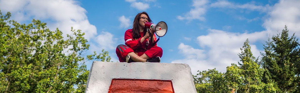 Girl sitting atop Engineering E 