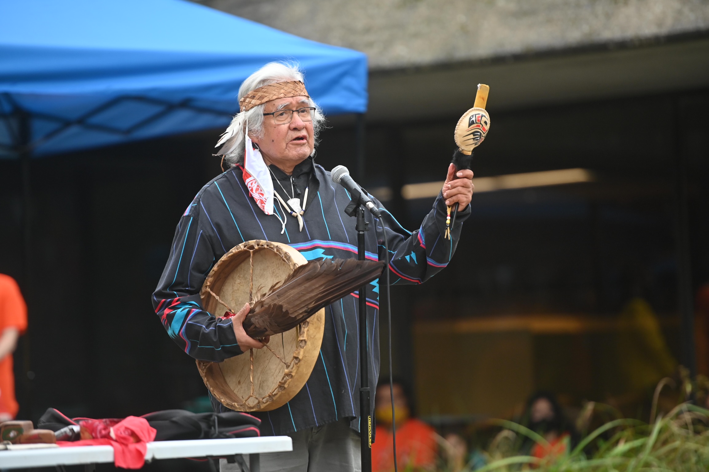 Elder Seis'lom addresses a crowd outside the Indian Residential School History and Dialogue Center on National Day for Truth and Reconciliation
