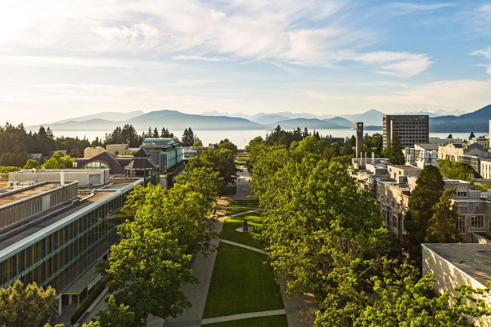 Aerial of the UBC Campus, with a view of the mountains in the distance