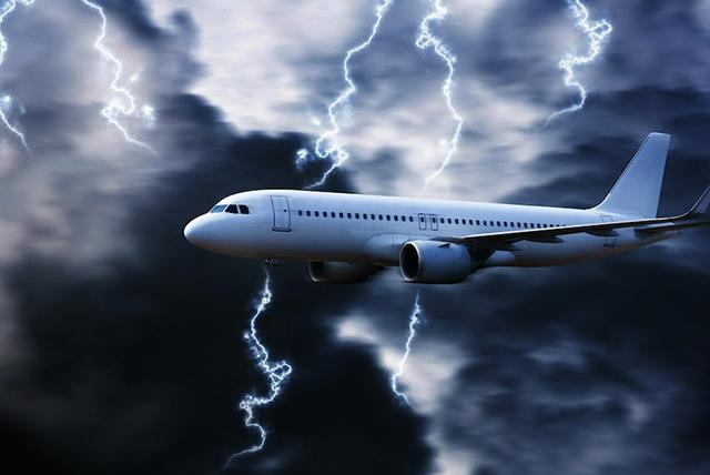 Airplane with lightning in the back