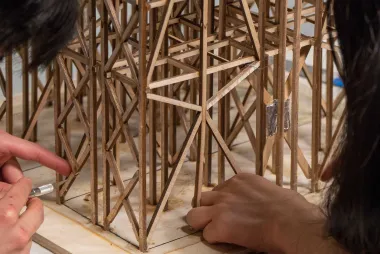 EERI Seismic Design Team members working on a wood structure prototype
