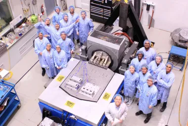 Orbit group in the lab looking up at the camera