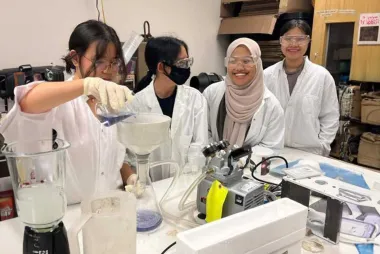 Team members in a lab