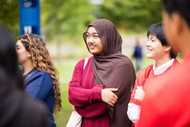 A diverse set of students getting to know each other.