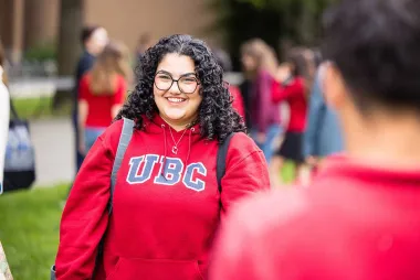 Student in red UBC hoodie