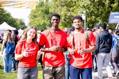 Group of 3 students in red engineering t-shirts