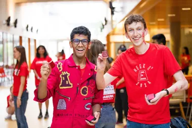 Students posing with engineering outfits