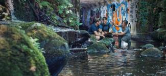 UBC environmental engineering students taking a reading in an urban creek.