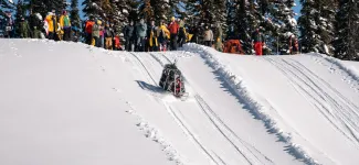 Concrete toboggan going down a snowy hill