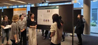 Green Joule members presenting their poster at MURC