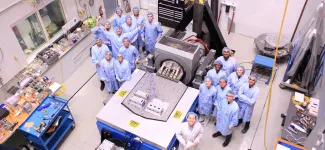 Orbit group in the lab looking up at the camera