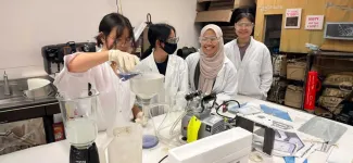 Team members in a lab