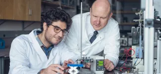 Two people working in a lab