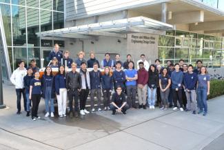 The UBC Sailbot Engineering Design Team poses for a group photo outside of the Wayne and William White Engineering Design Centre on the UBC Vancouver Campus.