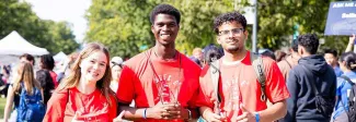 Group of 3 students smiling on UBC Imagine Day