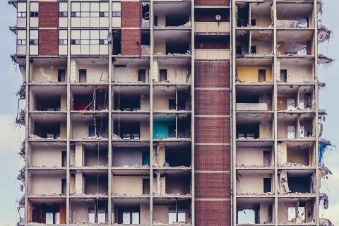 Side view of damaged high-rise building