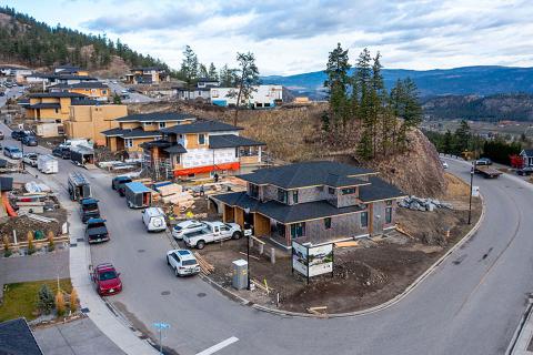 Houses and cars on a hill in Kelowna