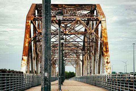 A bridge with rusted, worn-down coatings.