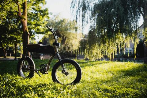 Photo of an e-bike in a field.