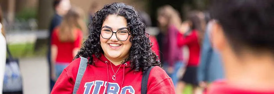 Engineering student in a red UBC hoodie