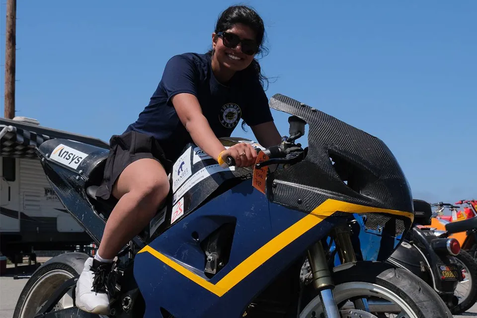 UBC Student Ananya Swaminathan riding UBC Thunderbike